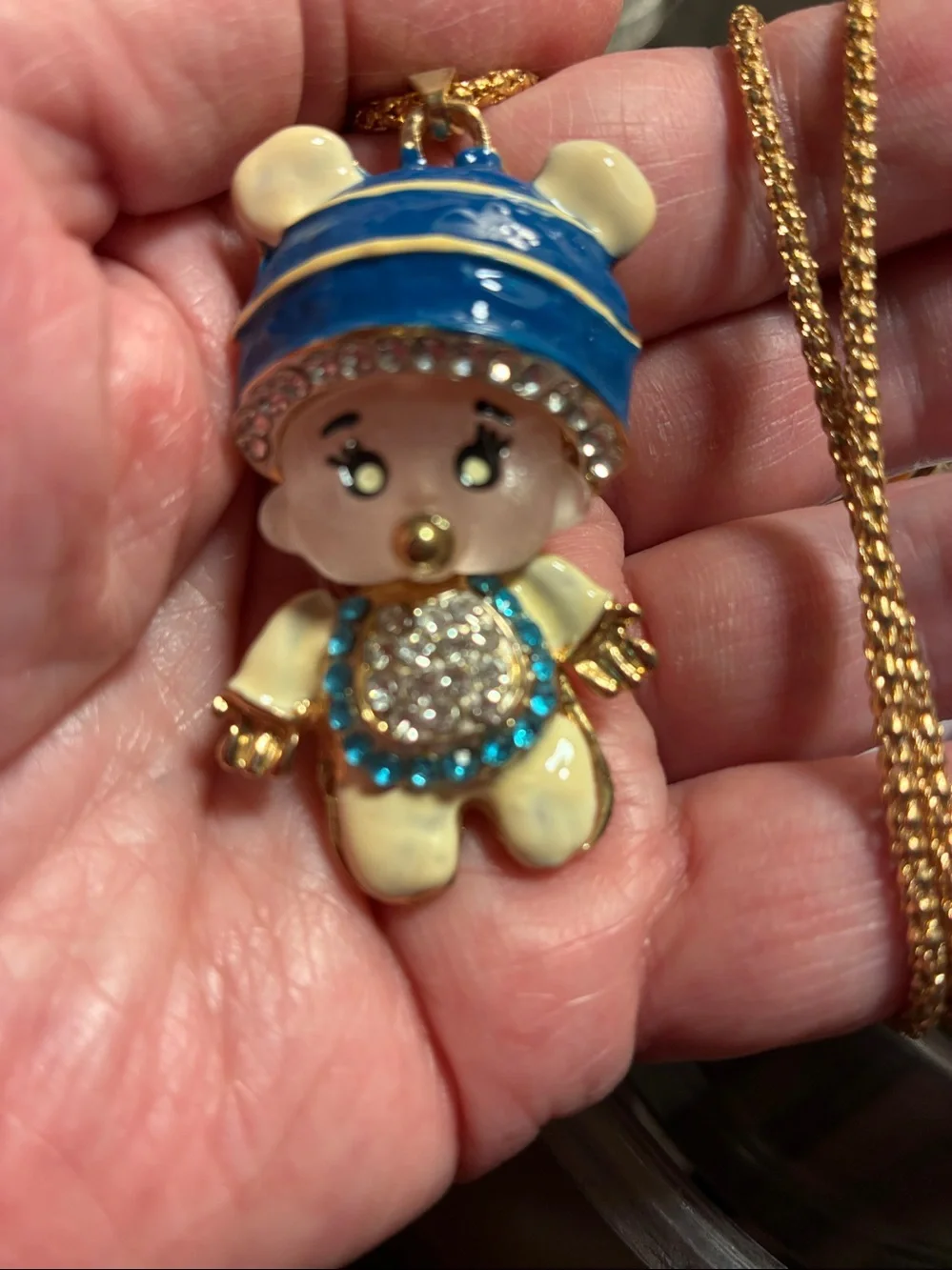 Moveable baby boy Pendant with Blue Hat and Crystal Accents. Head/body turn.